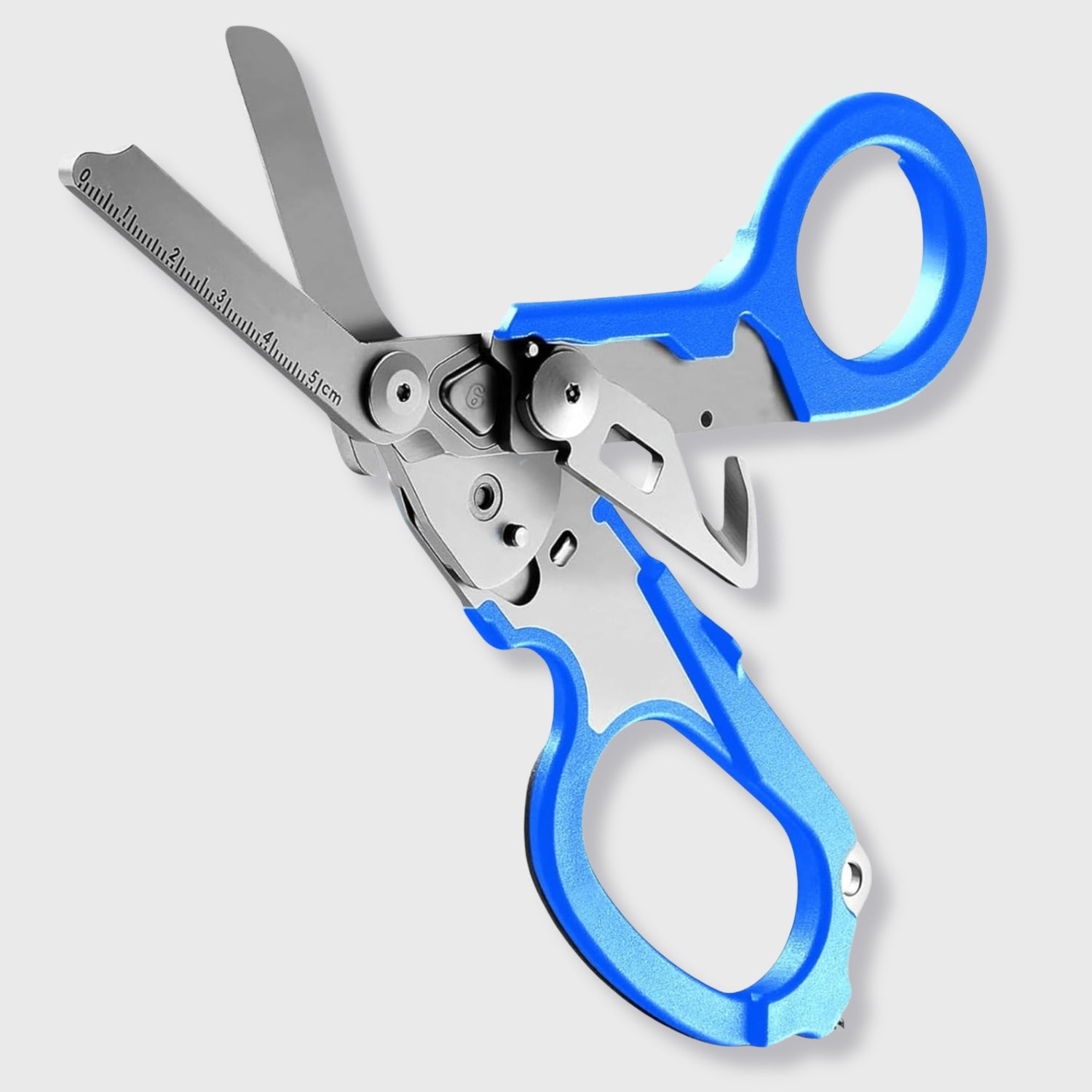 Blue 6-in-1 trauma shears with features: seat-belt cutter, ring cutter, window breaker, O₂ wrench, ruler