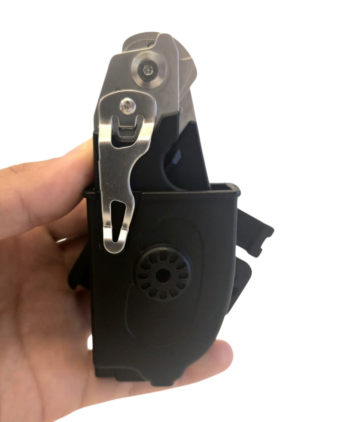 Folded trauma shears in belt holster for low-profile, secure closed carry.